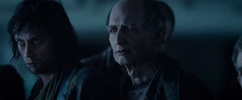 Movie still from “Warm Bodies” (2013), directed by Jonathan Levine – An old man is looking into the distance; Close Up shot, Over the shoulder angle