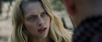 Movie still from “Warm Bodies” (2013), directed by Jonathan Levine – A person with blonde hair and blue eyes; Close Up shot, Over the shoulder angle