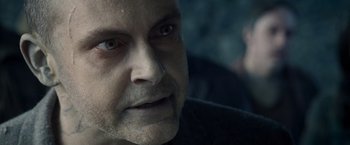 Movie still from “Warm Bodies” (2013), directed by Jonathan Levine – A man's face in a dark room; Close Up shot, Over the shoulder angle