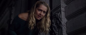 Movie still from “Warm Bodies” (2013), directed by Jonathan Levine – A woman with long blonde hair is looking at the camera; Close Up shot, Low angle