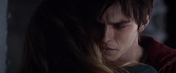 Movie still from “Warm Bodies” (2013), directed by Jonathan Levine – A person with long brown hair; Extreme Close Up shot, Over the shoulder angle