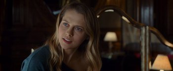 Movie still from “Warm Bodies” (2013), directed by Jonathan Levine – A beautiful young woman with long blonde hair and blue eyes; Close Up shot, Over the shoulder angle