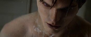 Movie still from “Warm Bodies” (2013), directed by Jonathan Levine – A man's face with water splashing all over him; Extreme Close Up shot, High angle