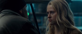 Movie still from “Warm Bodies” (2013), directed by Jonathan Levine – A young woman is looking at a man; Close Up shot, Over the shoulder angle