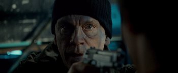 Movie still from “Warm Bodies” (2013), directed by Jonathan Levine – A person holding a gun; Close Up shot, Over the shoulder angle