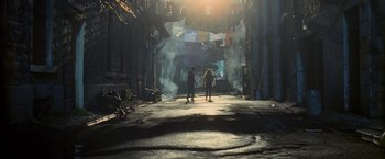 Movie still from “Warm Bodies” (2013), directed by Jonathan Levine – Two people are walking down a street in a city; Wide shot, Low angle