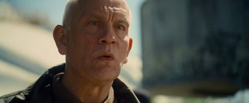 Movie still from “Warm Bodies” (2013), directed by Jonathan Levine – An older man is looking into the distance; Close Up shot, Low angle