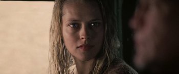 Movie still from “Warm Bodies” (2013), directed by Jonathan Levine – A woman with long blonde hair stares into the camera; Close Up shot, Low angle