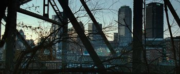 Movie still from “Warrior” (2011), directed by Gavin O'Connor – A view of a city skyline from a bridge; Extreme Wide shot, High angle