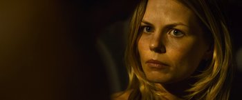 Movie still from “Warrior” (2011), directed by Gavin O'Connor – A person with long hair; Close Up shot, Over the shoulder angle