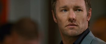 Movie still from “Warrior” (2011), directed by Gavin O'Connor – A man's face looking up at the sky; Close Up shot, Over the shoulder angle