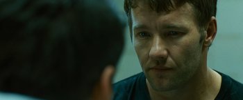 Movie still from “Warrior” (2011), directed by Gavin O'Connor – A person looking at the camera; Close Up shot, Over the shoulder angle