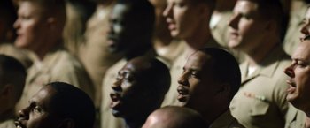 Movie still from “Warrior” (2011), directed by Gavin O'Connor – A group of soldiers singing; Close Up shot, Over the shoulder angle