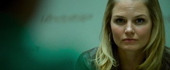 Movie still from “Warrior” (2011), directed by Gavin O'Connor – A person with long blonde hair; Close Up shot, Over the shoulder angle