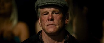 Movie still from “Warrior” (2011), directed by Gavin O'Connor – A person wearing a hat; Close Up shot, Low angle