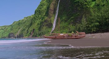 Movie still from “Waterworld” (1995), directed by Kevin Reynolds – A boat on the water near a waterfall; Extreme Wide shot, High angle
