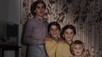 Movie still from “We Feed People” (2022), directed by Ron Howard – A group of young people standing next to each other; Medium shot, High angle