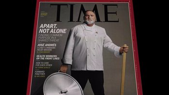 Movie still from “We Feed People” (2022), directed by Ron Howard – A man in a chef's outfit holding a wooden stick; Extreme Close Up shot, Overhead angle