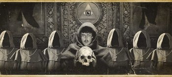 Movie still from “Weird: The Al Yankovic Story” (2022), directed by Eric Appel – A man with a skull in his hand and a skull in his hand; Medium shot, Overhead angle