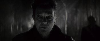 Movie still from “Werewolf by Night” (2022), directed by Michael Giacchino – A black and white photo of a woman's face; Close Up shot, Over the shoulder angle