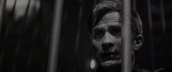 Movie still from “Werewolf by Night” (2022), directed by Michael Giacchino – A black and white photo of a man's face; Close Up shot, Low angle