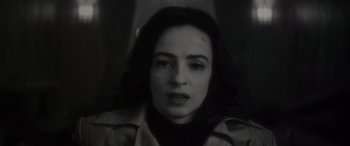 Movie still from “Werewolf by Night” (2022), directed by Michael Giacchino – A black - and - white photo of a woman's face; Close Up shot, High angle