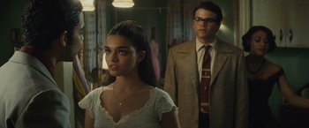 Movie still from “West Side Story” (2021), directed by Steven Spielberg – A man and a woman standing next to each other in a room; Close Up shot, Over the shoulder angle