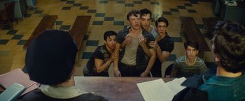 Movie still from “West Side Story” (2021), directed by Steven Spielberg – A group of young men standing in front of a mirror; Medium shot, High angle