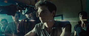 Movie still from “West Side Story” (2021), directed by Steven Spielberg – A man and a woman are looking at the camera; Close Up shot, Over the shoulder angle