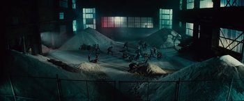 Movie still from “West Side Story” (2021), directed by Steven Spielberg – A group of people playing a game in the snow; Extreme Wide shot, High angle