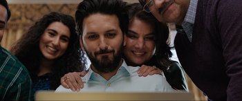 Movie still from “What's Love Got to Do with It?” (2022), directed by Shekhar Kapur – A man and a woman are hugging each other; Close Up shot, Low angle