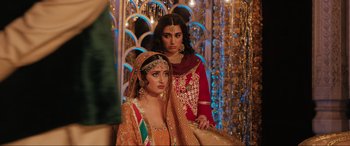 Movie still from “What's Love Got to Do with It?” (2022), directed by Shekhar Kapur – Two women dressed in traditional indian clothing; Medium shot, Over the shoulder angle