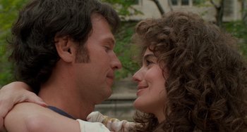 Movie still from “When Harry Met Sally...” (1989), directed by Rob Reiner – A man and a woman face to face in front of trees; Close Up shot, Over the shoulder angle