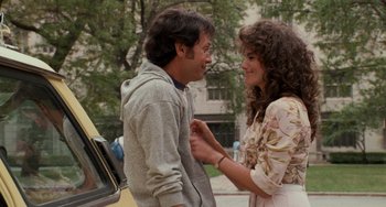 Movie still from “When Harry Met Sally...” (1989), directed by Rob Reiner – A man and a woman standing next to each other on the street; Medium shot, Over the shoulder angle