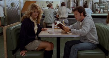 Movie still from “When Harry Met Sally...” (1989), directed by Rob Reiner – A man and a woman sitting at a table in a restaurant; Medium shot, Over the shoulder angle