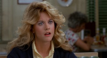 Movie still from “When Harry Met Sally...” (1989), directed by Rob Reiner – A person with long blonde hair; Close Up shot, Over the shoulder angle