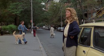 Movie still from “When Harry Met Sally...” (1989), directed by Rob Reiner – A woman standing on the side of the street; Wide shot, Low angle