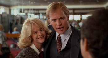 Movie still from “When Harry Met Sally...” (1989), directed by Rob Reiner – A man and a woman posing for a picture; Close Up shot, Over the shoulder angle