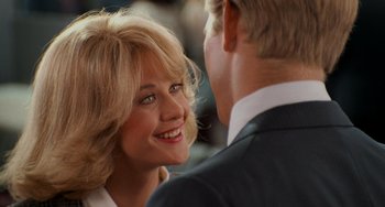 Movie still from “When Harry Met Sally...” (1989), directed by Rob Reiner – A man and a woman smiling at each other; Close Up shot, Over the shoulder angle