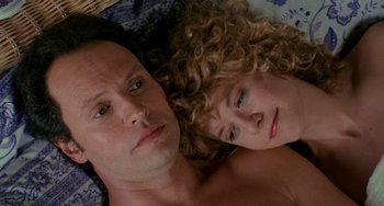 Movie still from “When Harry Met Sally...” (1989), directed by Rob Reiner – A man and a woman laying in bed together; Close Up shot, Overhead angle