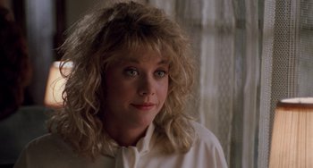 Movie still from “When Harry Met Sally...” (1989), directed by Rob Reiner – A person wearing a white shirt; Close Up shot, Over the shoulder angle
