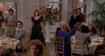 Movie still from “When Harry Met Sally...” (1989), directed by Rob Reiner – A group of people sitting around a table; Wide shot, Over the shoulder angle