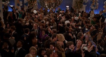 Movie still from “When Harry Met Sally...” (1989), directed by Rob Reiner – A large group of people gathered together at a party; Extreme Wide shot, Overhead angle