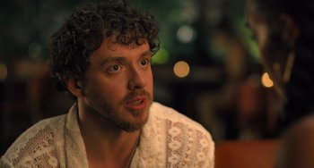 Movie still from “White Men Can't Jump” (2023), directed by Calmatic – A person wearing a white shirt; Close Up shot, Over the shoulder angle