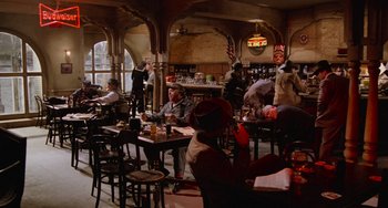 Movie still from “Who Framed Roger Rabbit” (1988), directed by Robert Zemeckis – A group of people sitting at tables in a restaurant; Wide shot, High angle