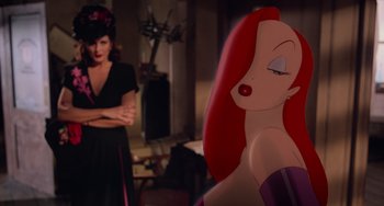 Movie still from “Who Framed Roger Rabbit” (1988), directed by Robert Zemeckis – A woman standing in front of an animated character; Medium shot, Over the shoulder angle