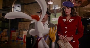 Movie still from “Who Framed Roger Rabbit” (1988), directed by Robert Zemeckis – A man and a woman standing next to each other; Medium shot, Over the shoulder angle