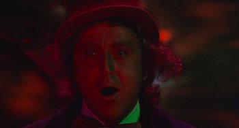 Movie still from “Willy Wonka & the Chocolate Factory” (1971), directed by Mel Stuart – A person wearing a hat; Close Up shot, Low angle