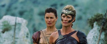 Movie still from “Wonder Woman” (2017), directed by Patty Jenkins – A couple of women standing next to each other; Close Up shot, Low angle
