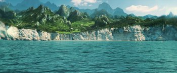 Movie still from “Wonder Woman” (2017), directed by Patty Jenkins – A body of water surrounded by a mountain range; Extreme Wide shot, High angle